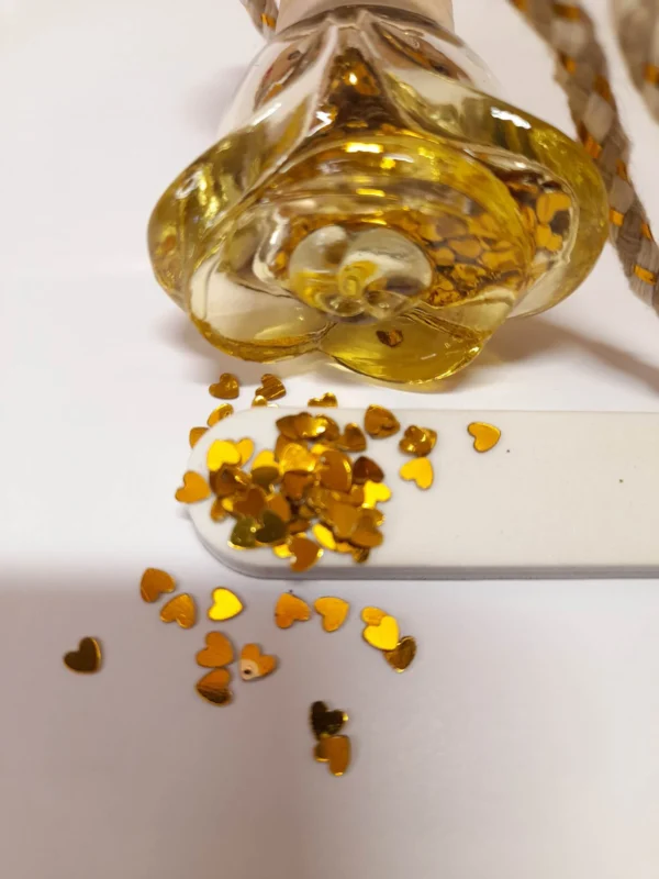 Flacon en verre jaune Paillettes cœur or.