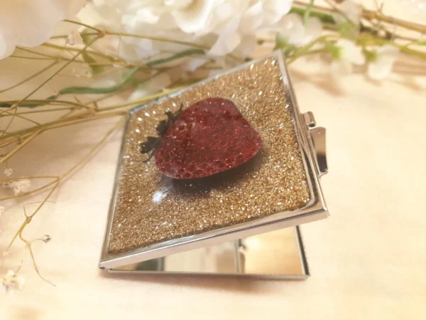 miroir pailleté or motif fraise